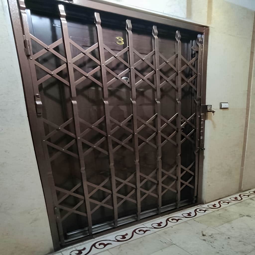 سفارش درب آکاردئونی سه گل تسمه برای ورودی واحد
