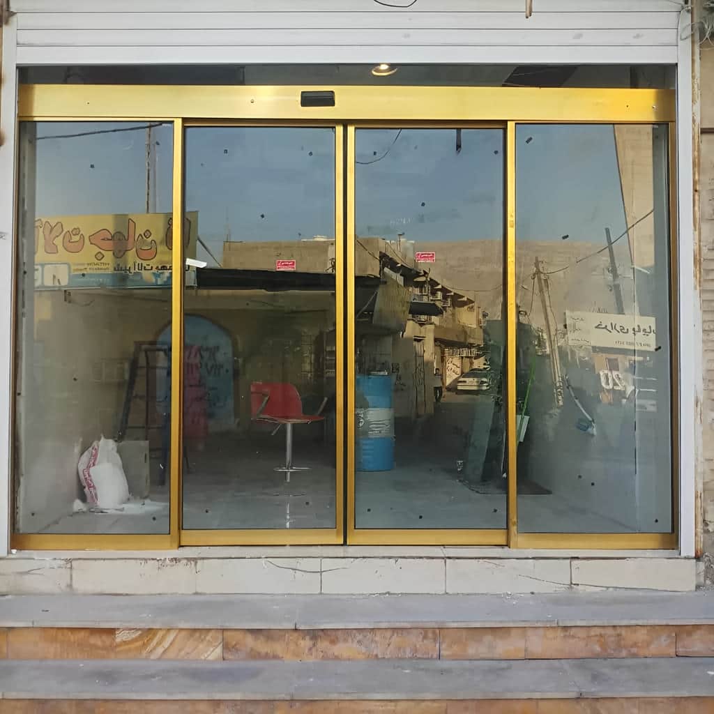 قیمت درب اتوماتیک شیشه ای گردان لابی بر اساس شیشه و فریم