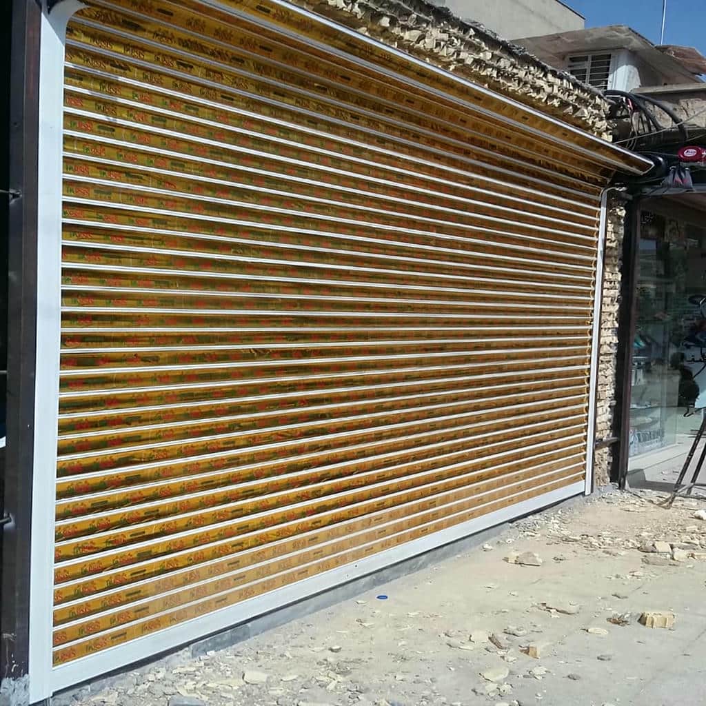 خدمات درب کرکره ای مغازه صنعتی برای تنظیم ریل و شفت
