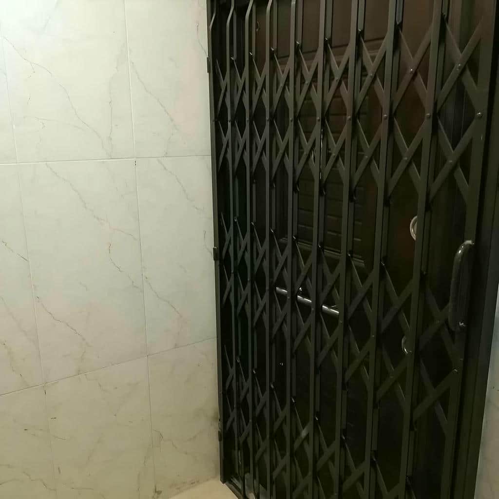 درب آکاردئونی مناسب ویلا و باغ با شبکه فلزی متراکم