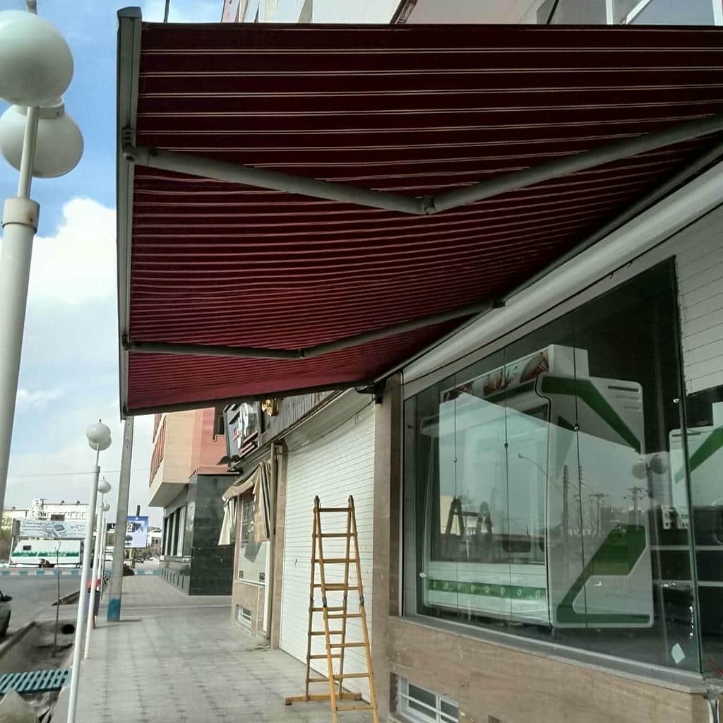 سایبان حیاط با موتور برقی و سازه بازویی
